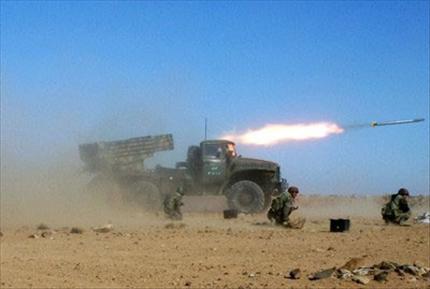 صورة وزعتها وكالة «سانا» لمناورات عسكرية أجرتها وحدات الصواريخ والمروحيات والدبابات التابعة للجيش السوري أمس 