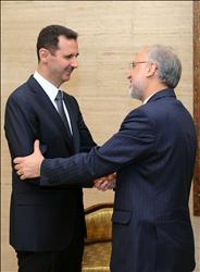 الأسد خلال استقباله صالحي في دمشق أمس (أ ف ب) 