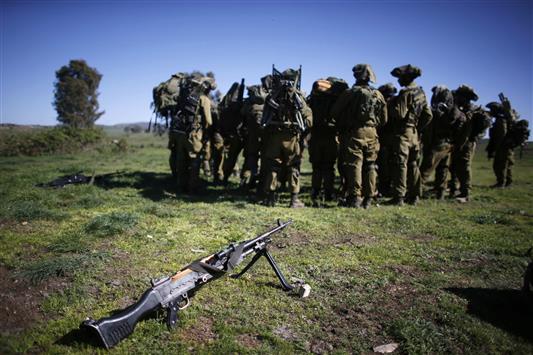 جنود اسرائيليون في الجولان السوري المحتل (رويترز)