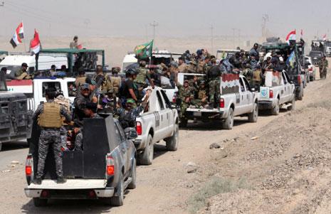 شدد المتحدث باسم «الحشد» على أن بغداد بالنسبة إلى القيادة العسكرية و«الحشد» خط أحمر (أ ف ب)
