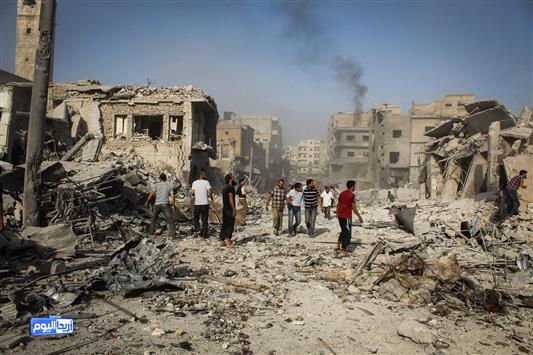 صورة وزعتها مجموعة "اريحا اليوم" المعارضة للدمار في المدينة جراء سقوط طائرة حربية سورية أمس (ا ب ا)