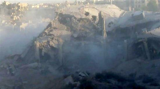 مبنى كان المسلحون يتحصنون فيه بعد تفجيره من قبل الجيش السوري في جوبر