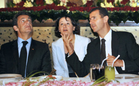 الأسد وساركوزي على مأدبة العشاء