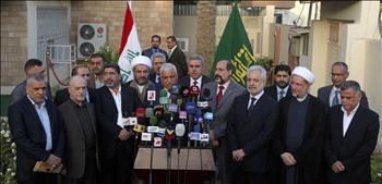 النائب فالح الفياض خلال الإعلان عن ترشيح «التحالف الوطني» للمالكي في بغداد أمس