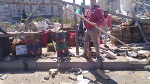  لإزالة الإشغالات في شارع خالد بن الوليد