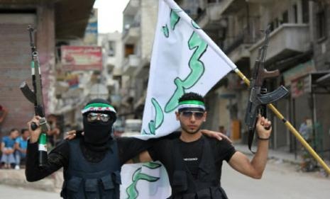 صورة وزعت على أنها لمسلحين في سلقين في ريف إدلب أول من أمس (أ ف ب) 