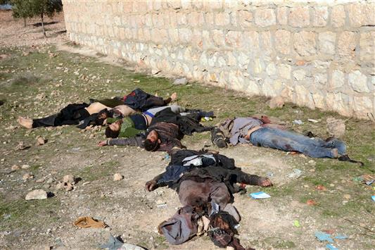 صورة وزعتها وكالة "سانا" امس لجثث مسلحين في حلب (ا ف ب)