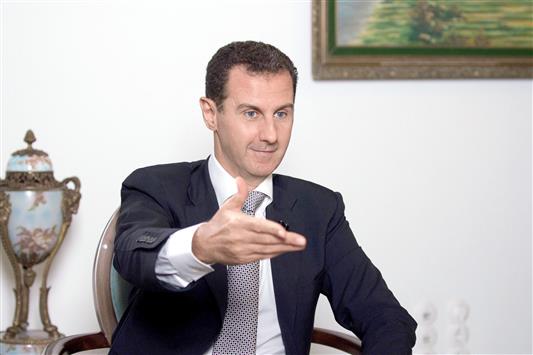 الأسد خلال مقابلة لوكالة "برنسا لاتينا" الكوبية في دمشق (أ ب أ)