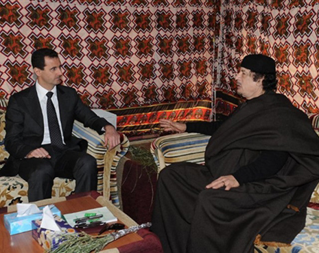 الأسد والقذافي