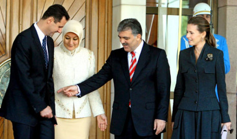 أسماء الأسد وغول وعقيلته خير النساء والأسد في أنقرة أمس.