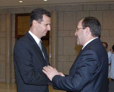الأسد والمالكي في لقاء سابق بدمشق