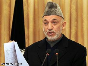 كرزاي فاز برئاسة أفغانستان بعد انسحاب منافسه عبد الله عبد الله من جولة الإعادة.