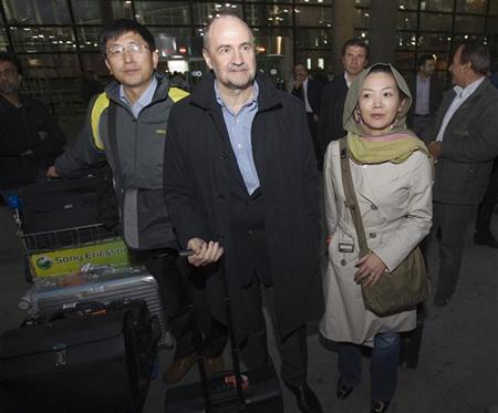 مفتشو الوكالة الدولية للطاقة الذرية لدى وصولهم إلى مطار الامام الخميني الدولي يوم الاحد.