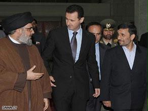 نصر الله يتحدث للأسد ونجاد في طريقهم لمأدبة العشاء